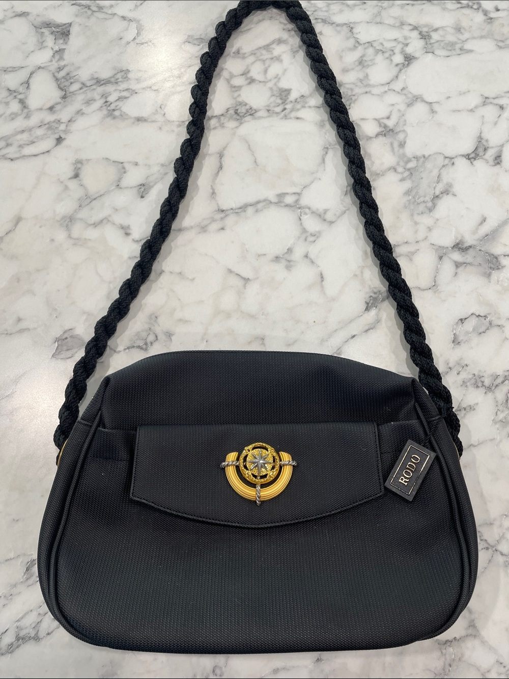 Rodo Vintage 1980s Black Shoulder Bag with Braided Strap Nautical Gold Medallion